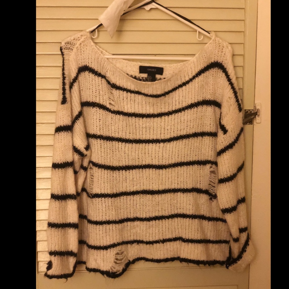 Distressed striped sweater